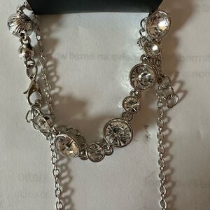 Brand New Paparazzi Chic Silver Colored matching necklace and bracelet.